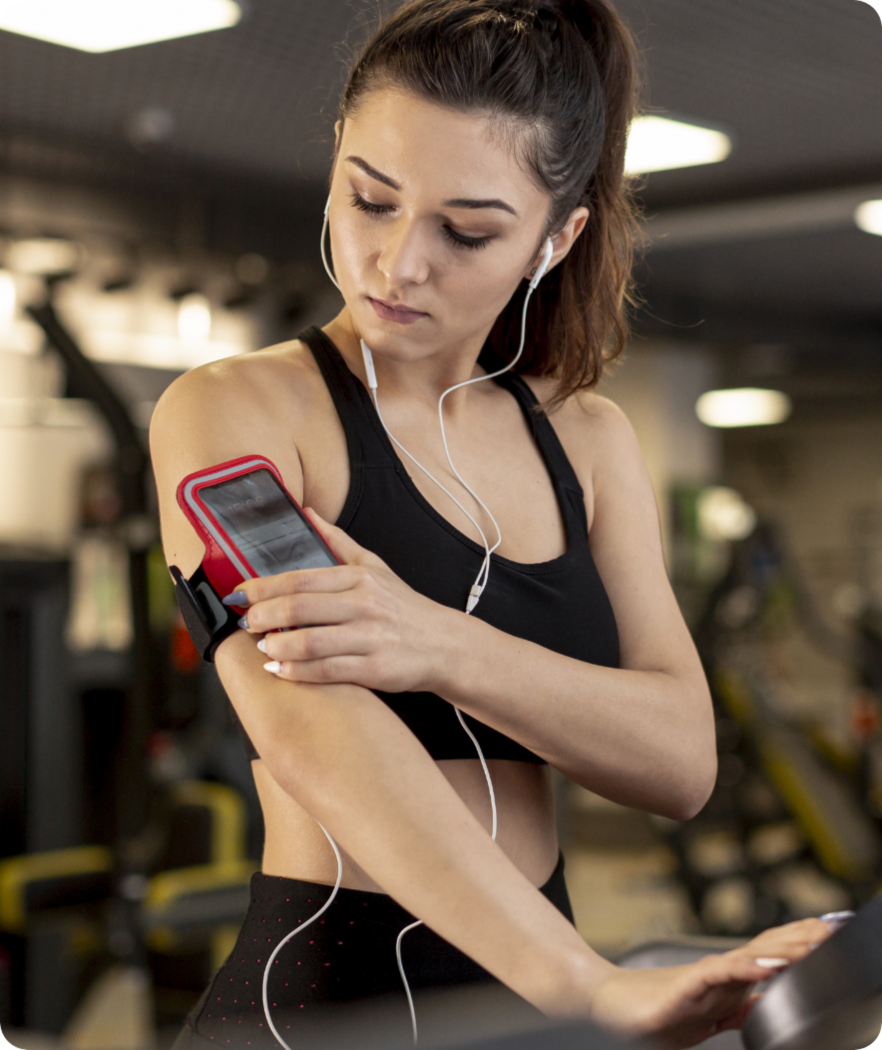 Athlete taking off phone on their arm